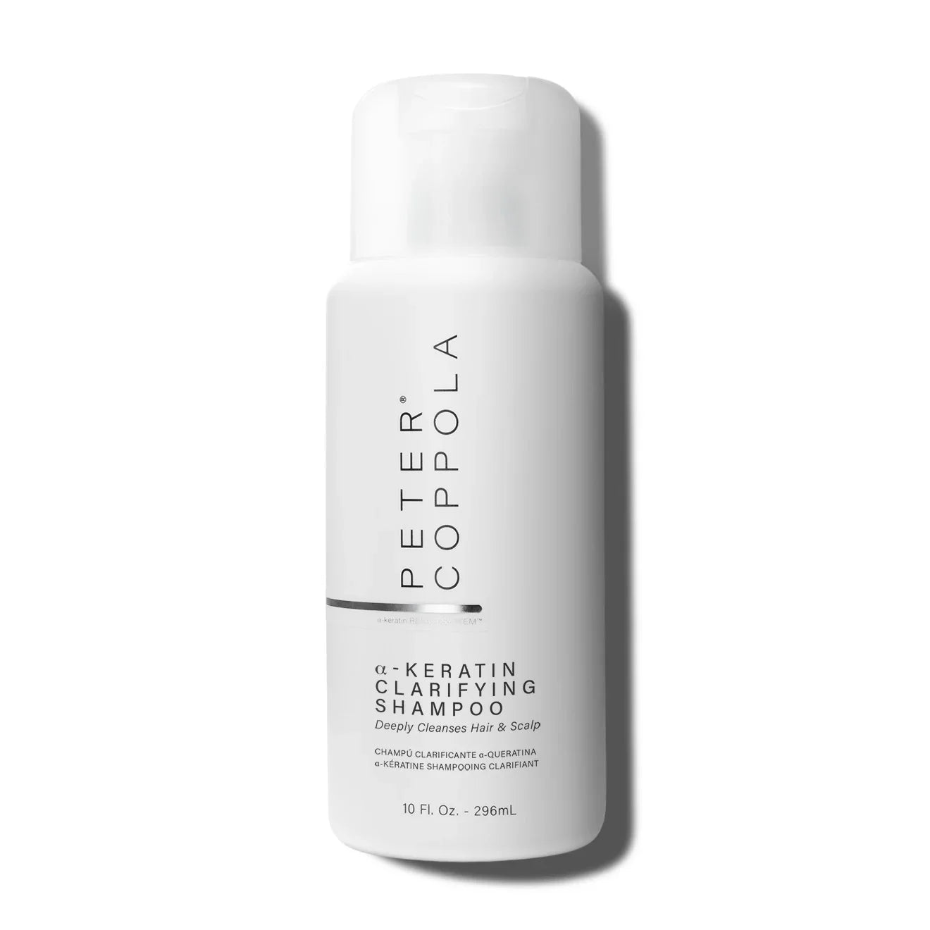 Peter Coppola bottle of keratin clarifying shampoo for smoothing hair treatment on a white background