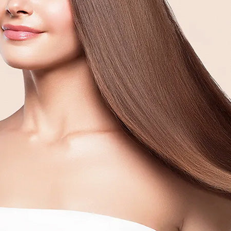 Closeup of light brown, smooth, keratin treated hair
