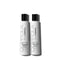Two bottles of Peter Coppola hair care products on a white background