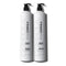 Two bottles of Peter Coppola total repair shampoo and conditioner on a white background