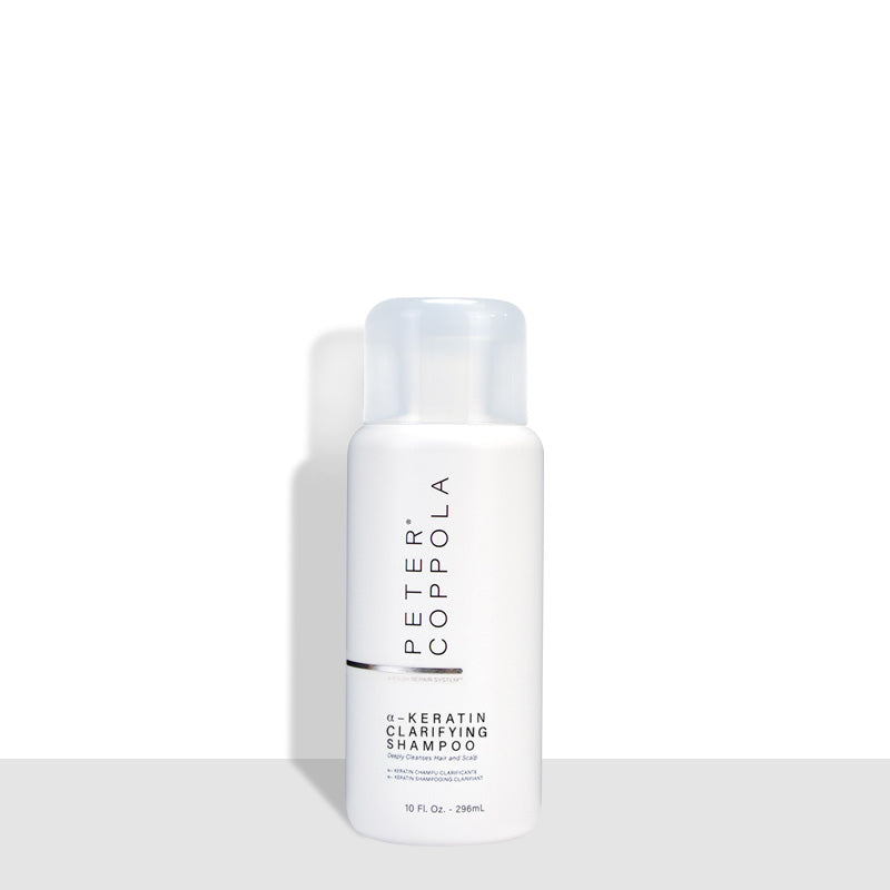 10 ounce white bottle of a-keratin clarifying shampoo
