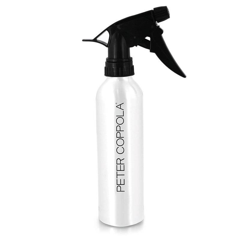 gray spray bottle with black top and peter coppola logo printed on the side